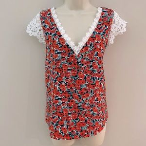 Woman’s SHEIN floral blouse